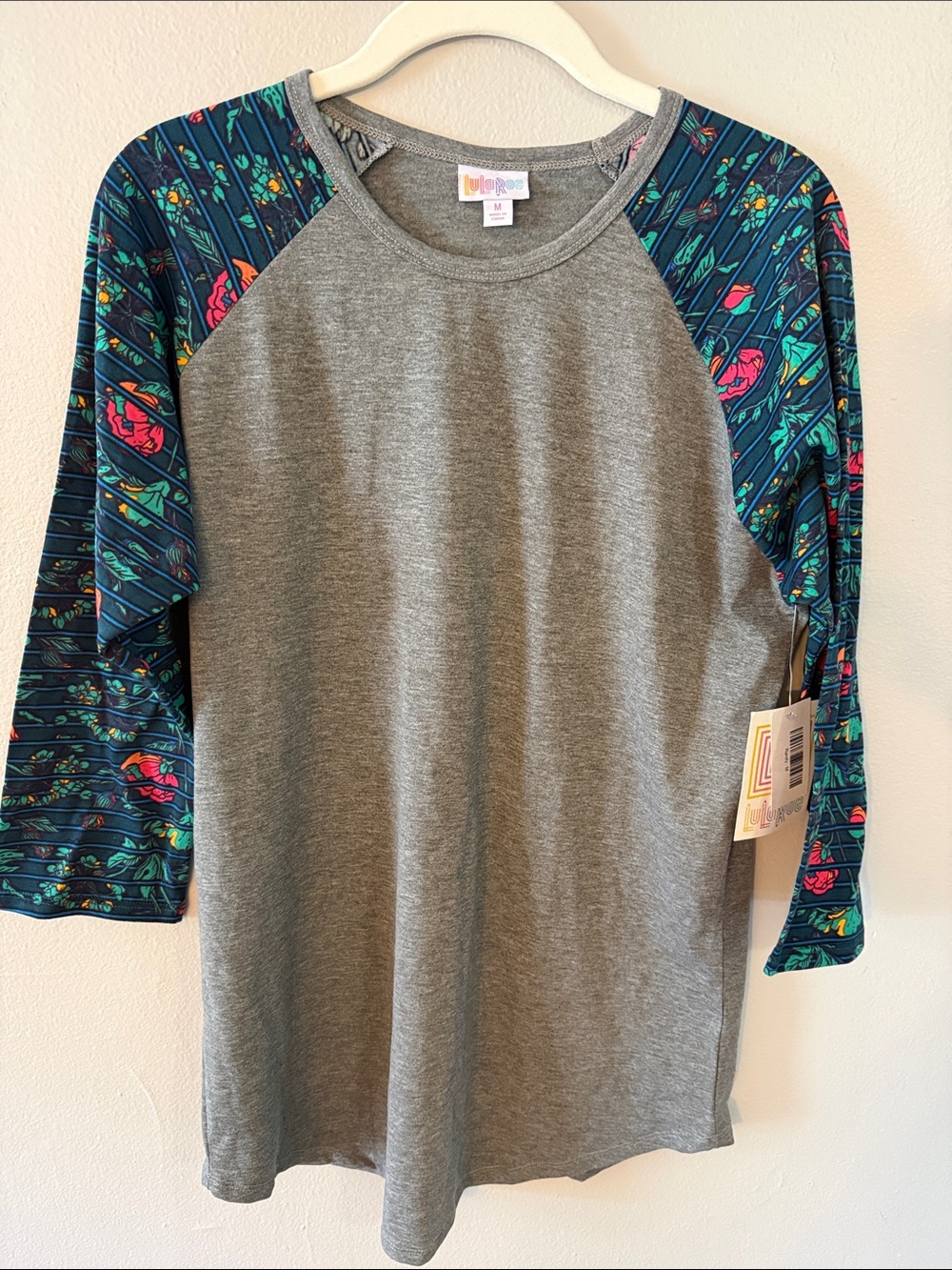 LuLaRoe Gray Tee with Teal Floral Stripe Raglan Sleeves